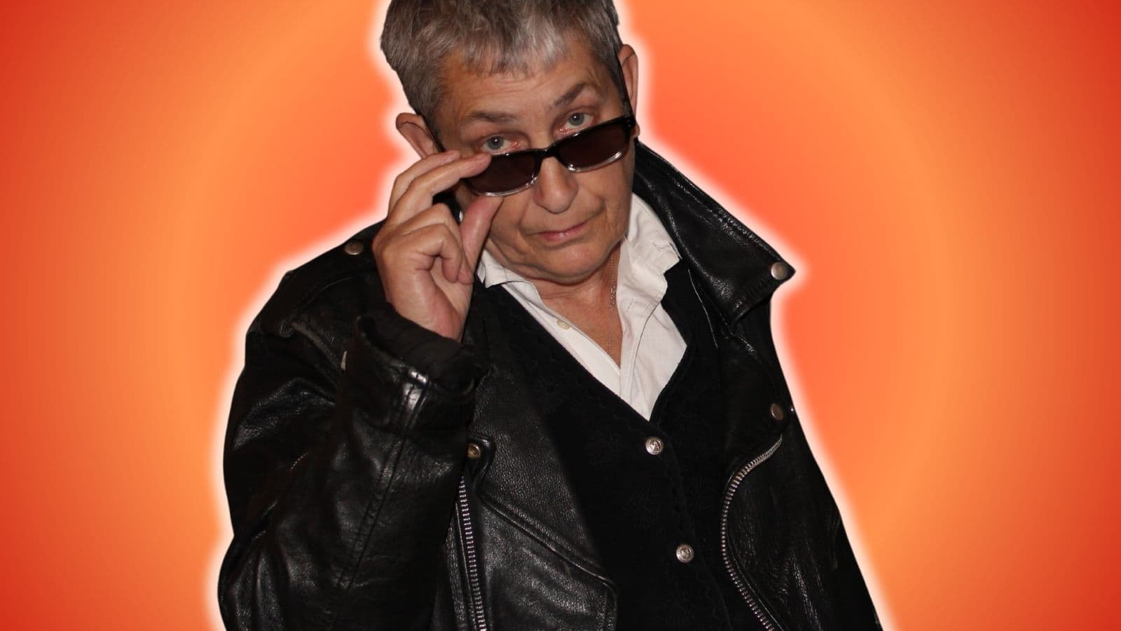 Claire Dowie in leather jacket and shades